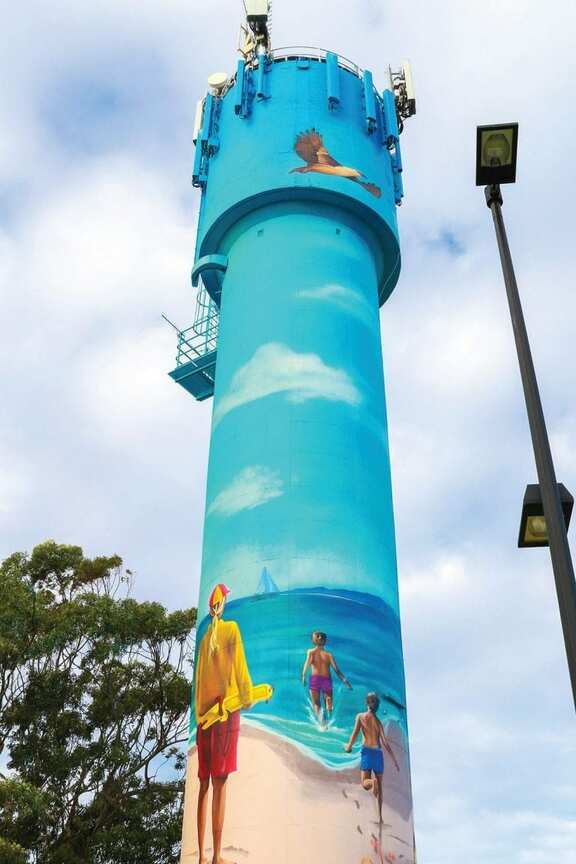 Local Mural Artist Paints Water Tower