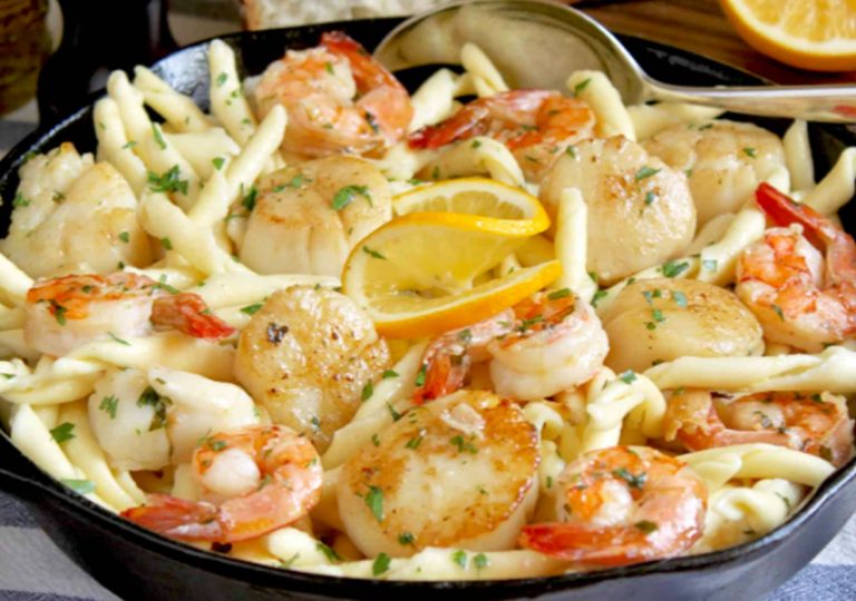 Seafood pasta with shrimp and scallops and garlic